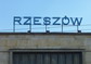 powiększ